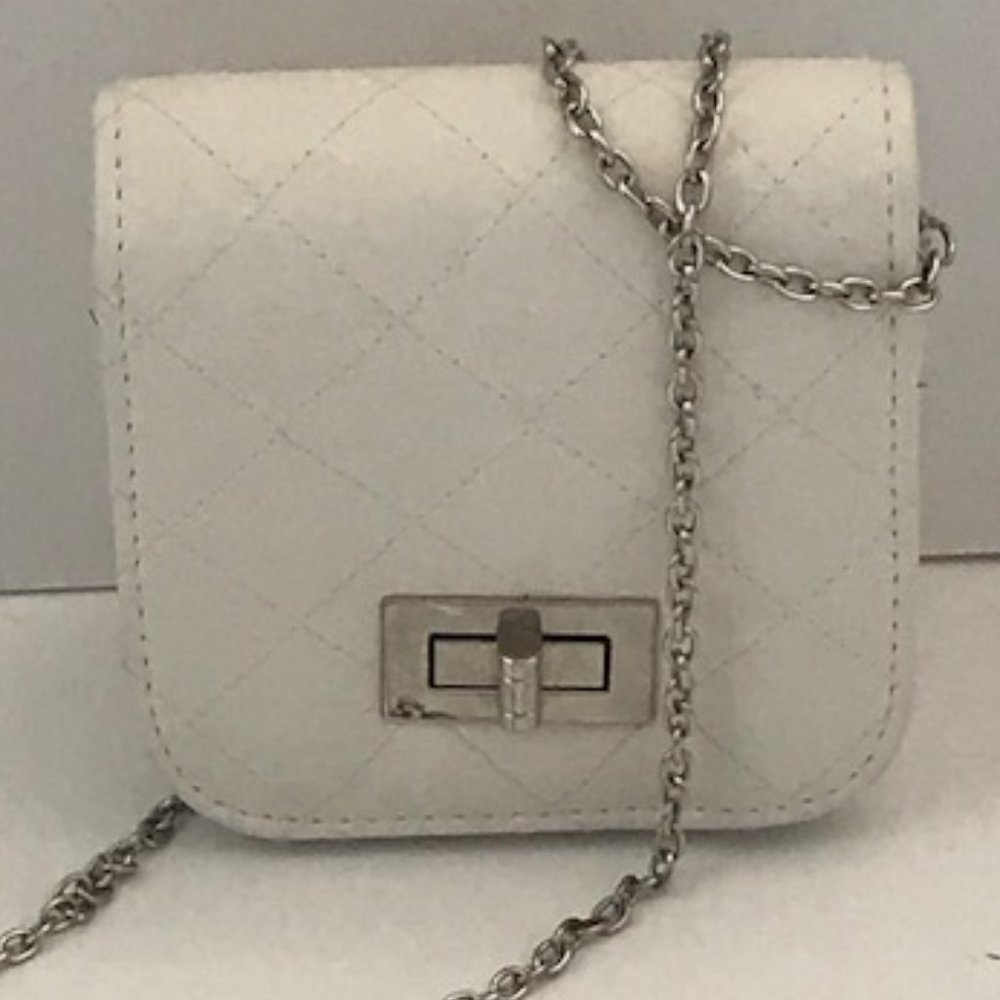 White clutch strap purse